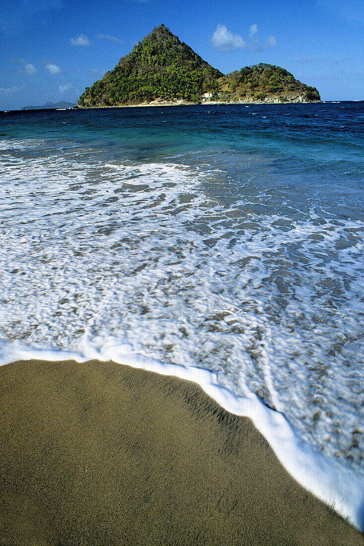 Seaside, at back Petit-Martinique island. Grenada island. Caribbean