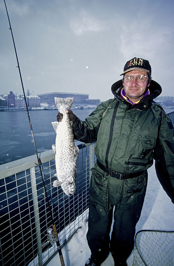 Salmon caught from a bridge. Stockholm. Sweden