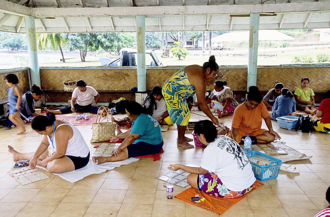 Women playing Bingo. Hiva-Oa island. Marquesas archipelago. French Polynesia