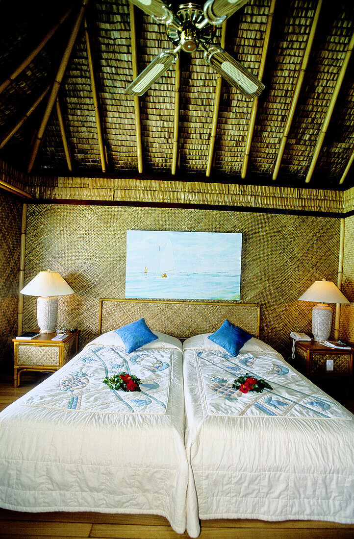 Interior of a luxury bungalow hotel buit on stilts over the lagoon. Bora-Bora in the Leeward islands. Society archipelago. French Polynesia