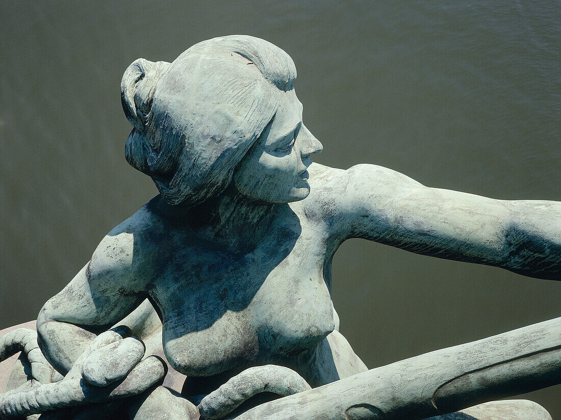 Sculpture overlooking Seine river on Bir-Hakeim bridge. Paris, France
