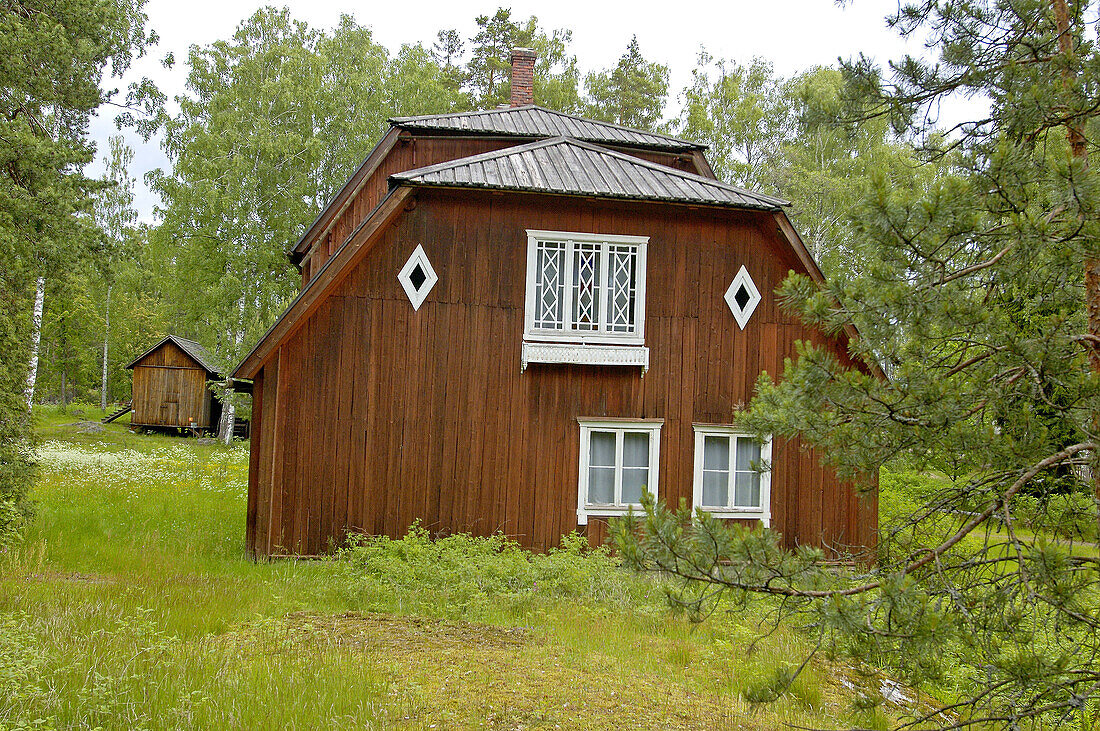 The Seurasaari park featuring ancient houses on an islet. Helsinki. Finland