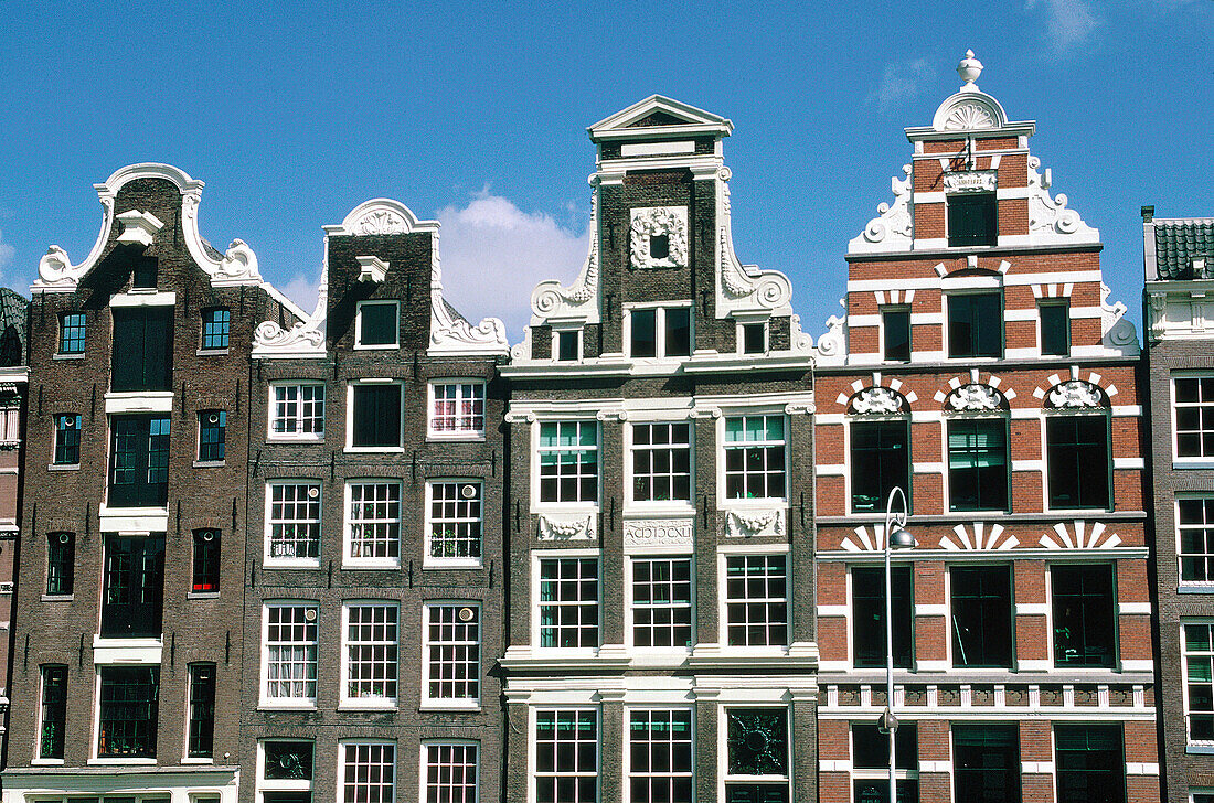 Facades of old brick houses. Amsterdam. Holland