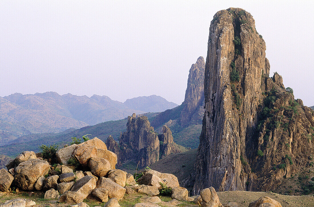 Landscape with basaltic rocks and Zivi peak at the back near Rumsiki village (Kapsikis tribe). Mounts Mandara. North Cameroon