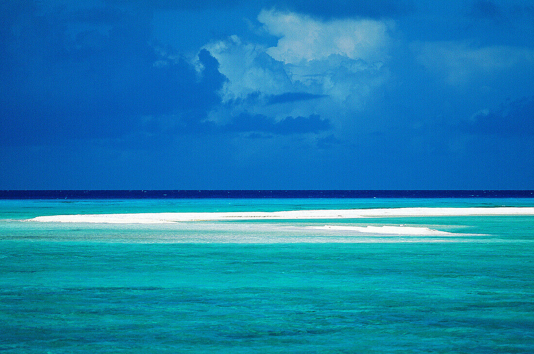 Remote sand islet in the lagoon. Manihi atoll. Tuamotu Archipelago. French Polynesia