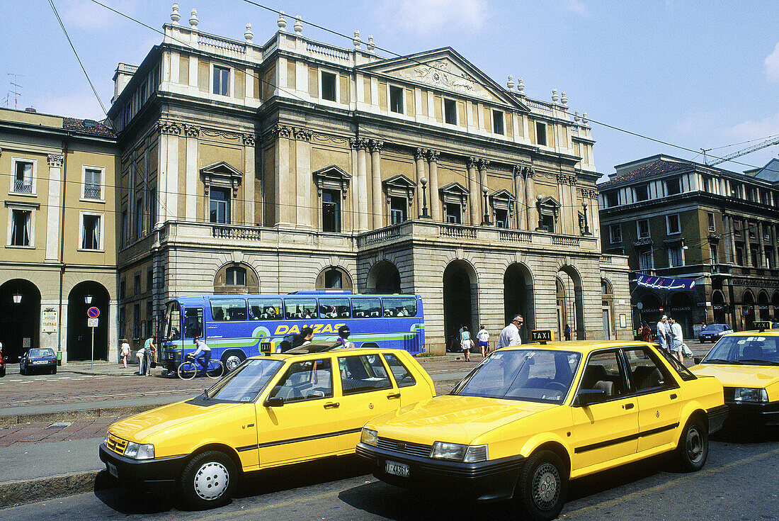 La Scala theater and taxis waiting on the square. Milan. Italy