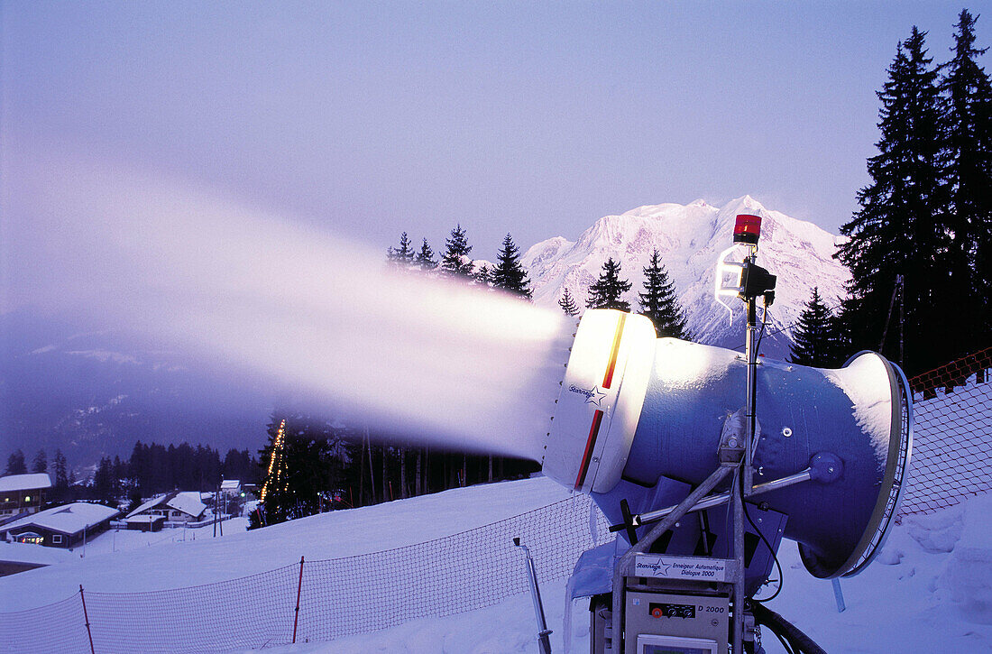 Snow gun at dusk. Megeve in winter. Haute-Savoie. Alps. France