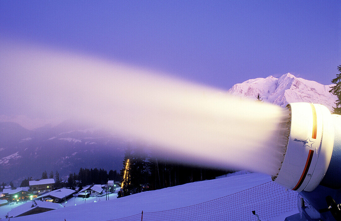 Snow gun at dusk. Megeve in winter. Haute-Savoie. Alps. France