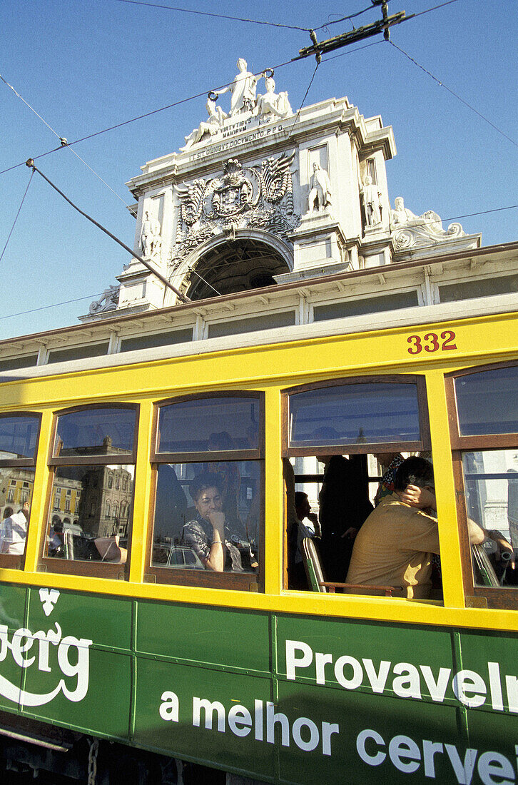 Local Tramway Electrico passing by Praça do Comercio. Lisbon. Portugal