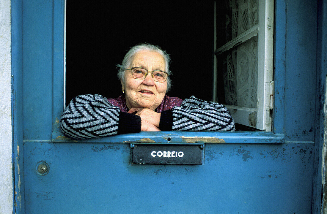 Old lady at window. Bairro Alto. Lisbon. Portugal