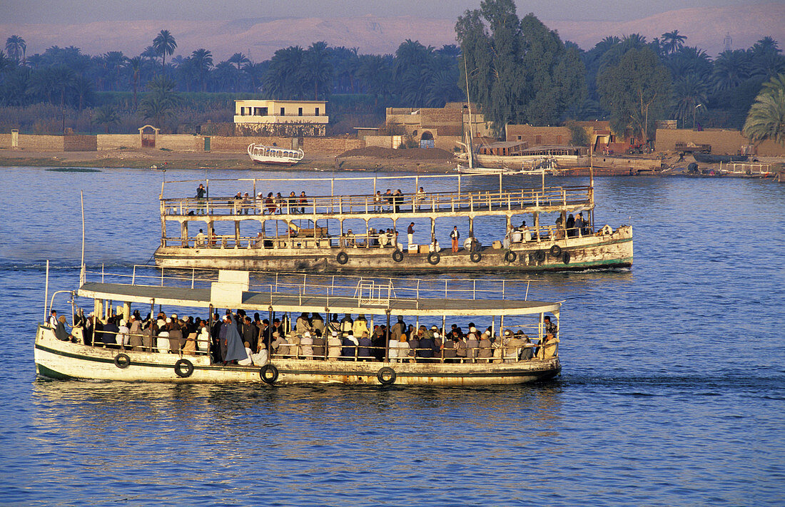 Local ferry crossing from West Bank. River Nile from East Bank. Luxor. High Egypt. Egypt