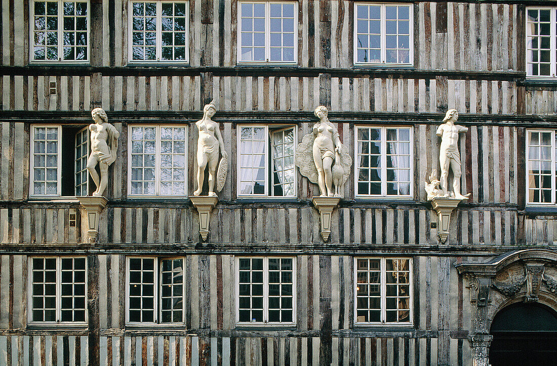 Half-timbered medieval house ornamented with stone statues. Rouen. Seine-Maritime. Normandie. France