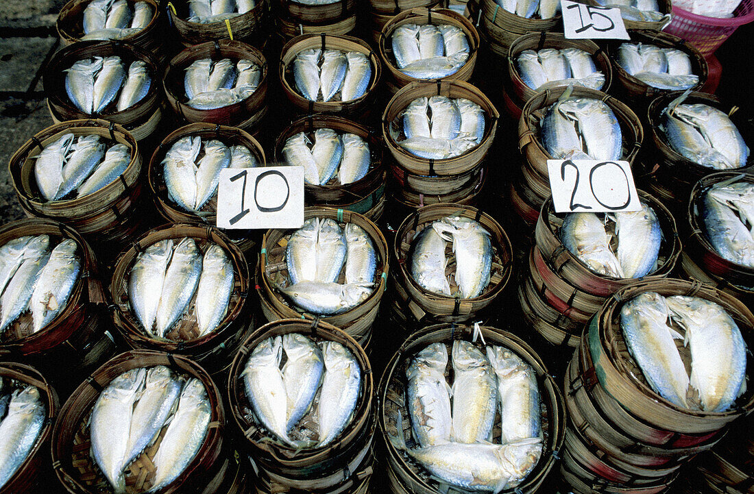 Small fishes in baskets. Mahachai Market. Near Bangkok. Thailand