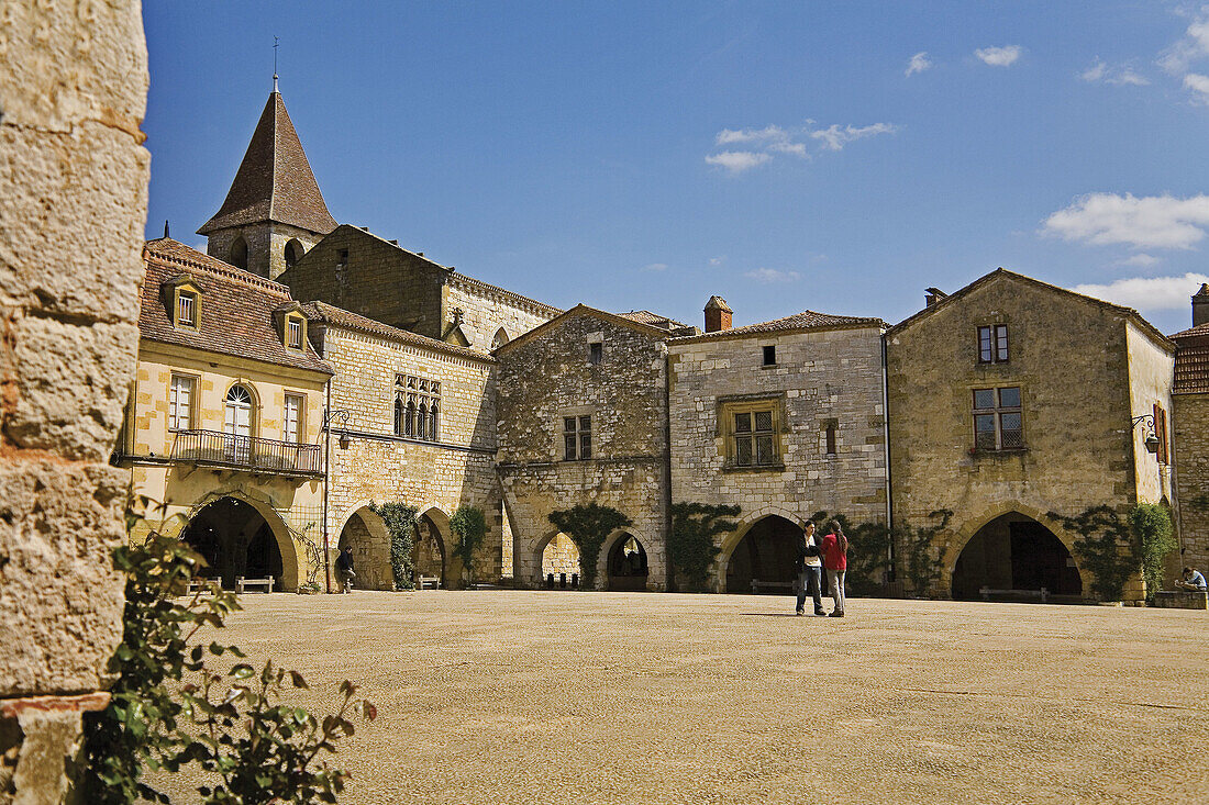 Main square at Monpazier. Dordogne. France.