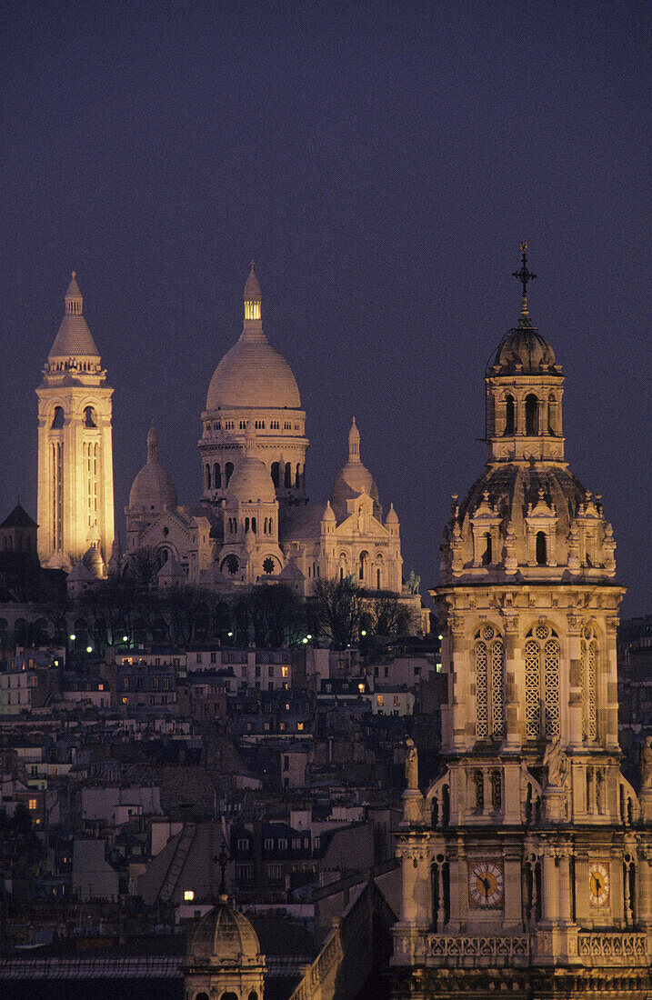 The Sacré Coeur Basilica. La Trinité church. Paris. France.