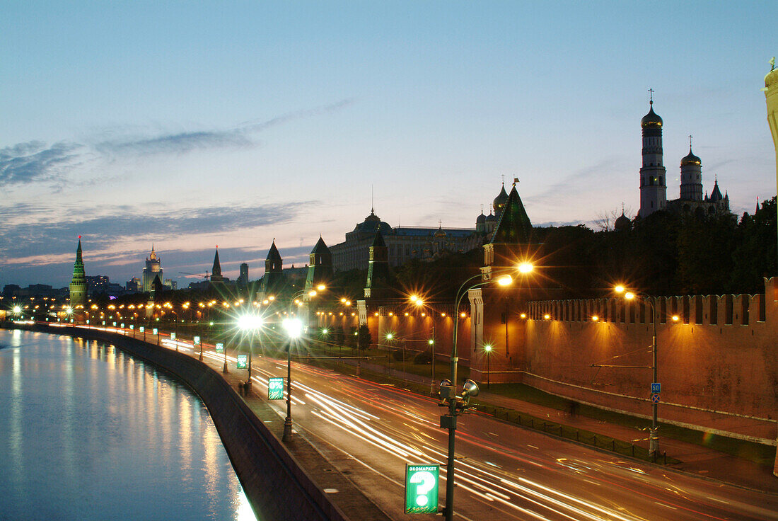 Moscow, Russia, Kremlevskaya Nab, Kremlin Walls, Neva River, at twilight, with traffic, rush hour, car light streaks.