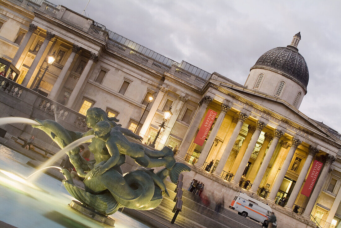 Fountain and National Gallery at Trafalgar Square, London. England, UK