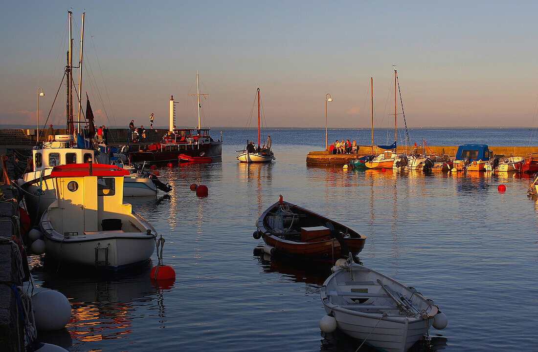 Last sun rays at the harbour of Arlid, Skane, southern Sweden