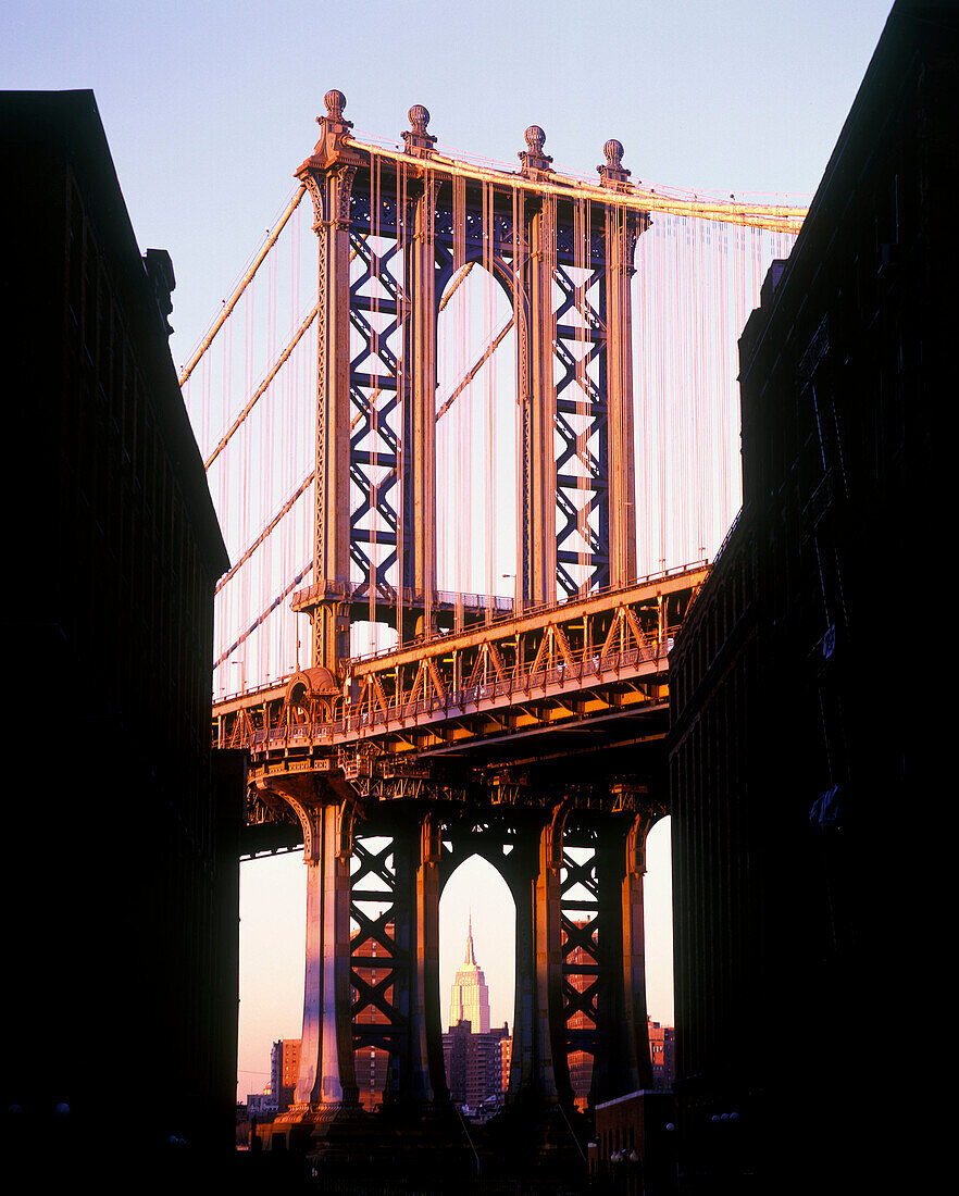 Manhattan bridge tower & empire state building, New York, USA.