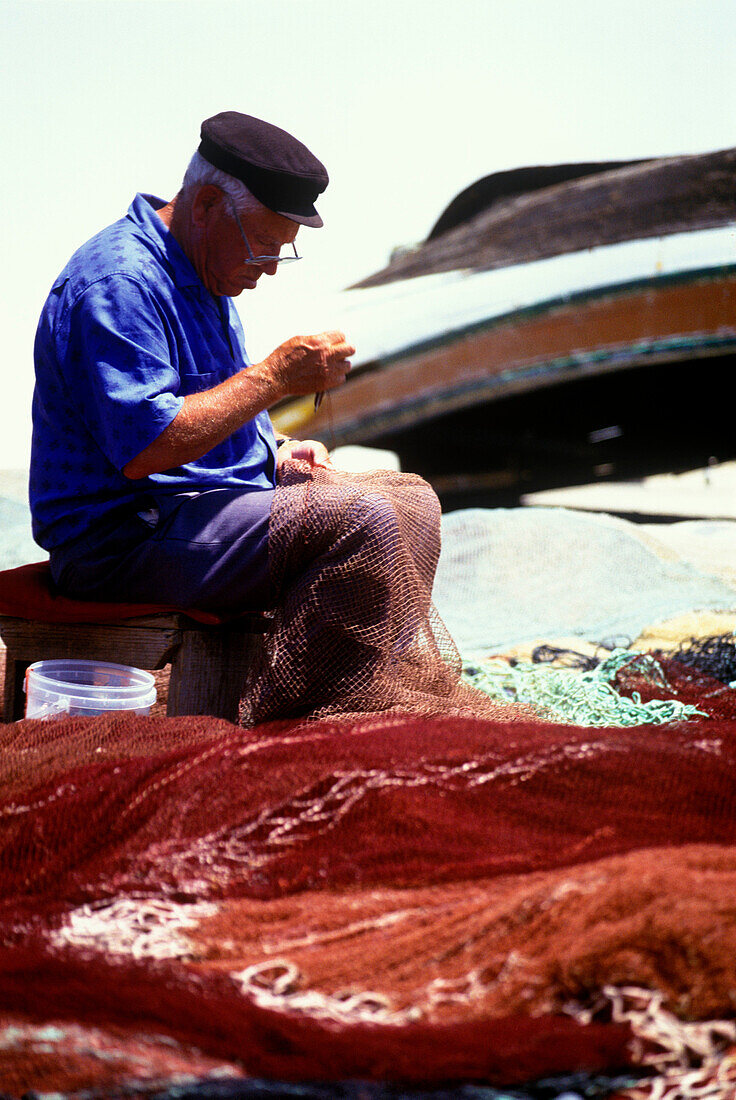 Fisherman, Albufeira, Algarve, Portugal.