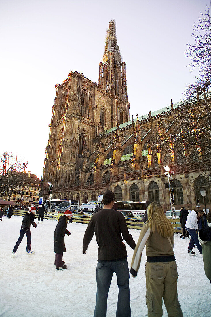 Skaters at the Strasbourg cathedral. Alsace. France