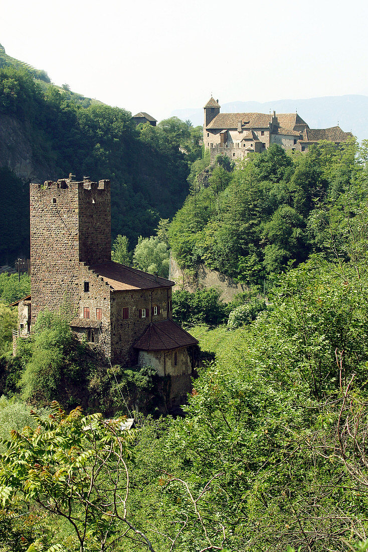 Old house and Castel Roncolo. Val Sarentino, Trentino-Alto Adige. Italy