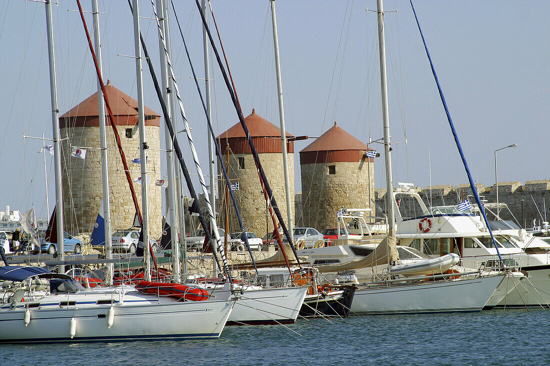 Mandraki harbour, old city. Rhodes. Dodecanese, Greece