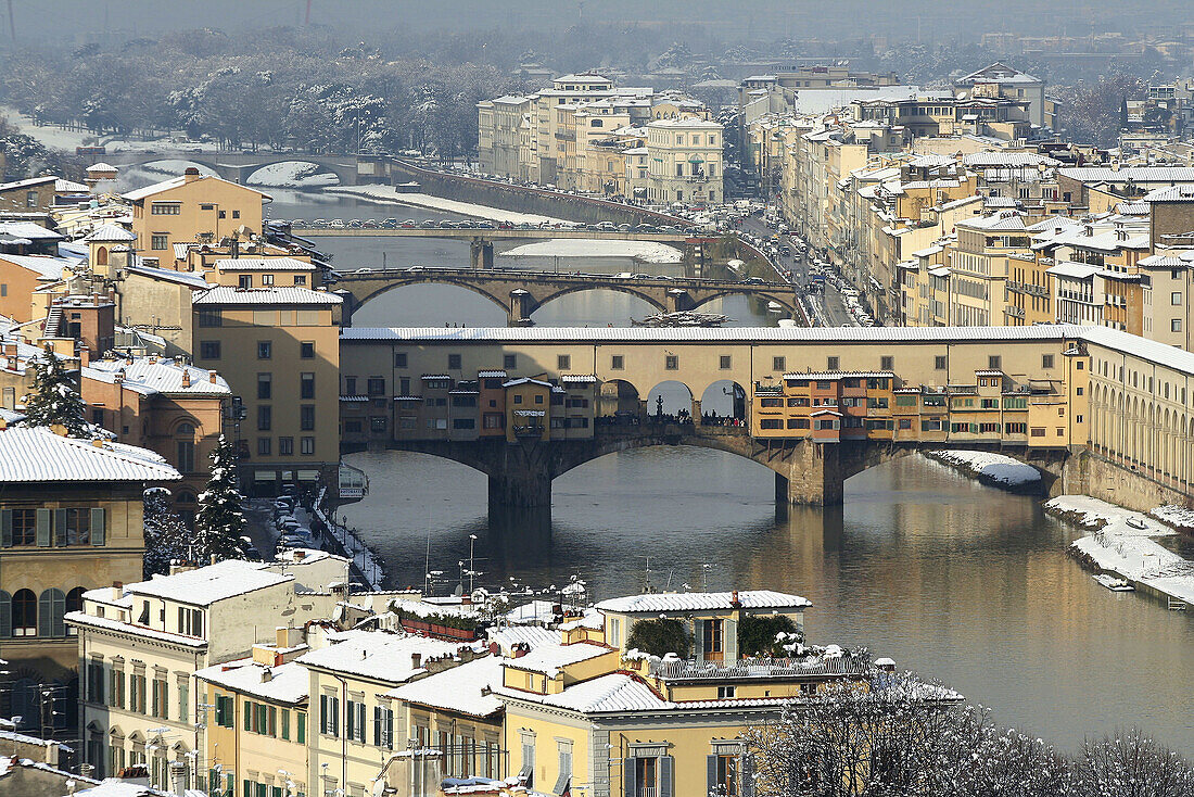 Snow covered Ponte Vecchio, Florence. Tuscany, Italy