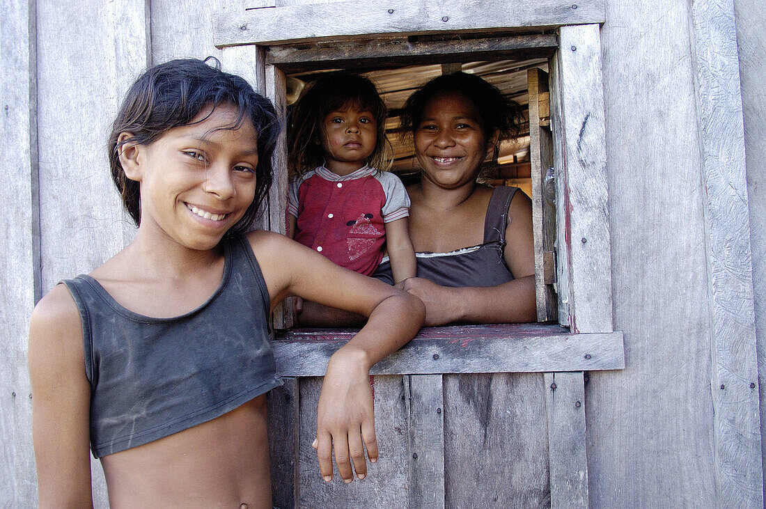 Brazilian family. Negro River, Manaus. Brazil