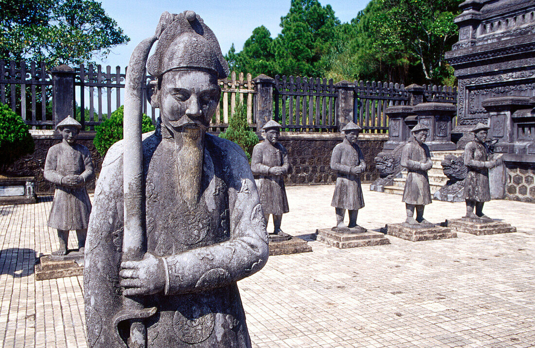 Statuary of mandarins outside the tomb of Khai Dinh, emperor of Vietnam (1916-25), near Hue. Vietnam