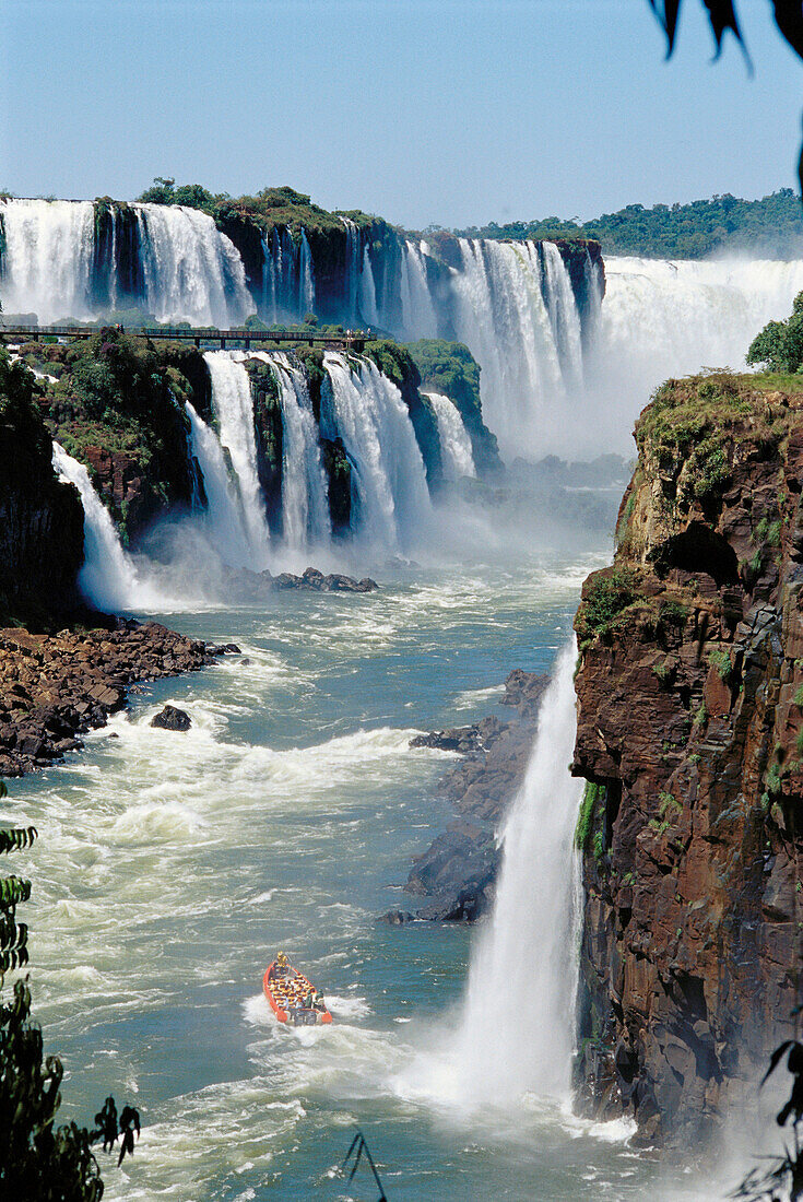 Iguazu Falls and river. On the right bank, Argentina, San Martín island. On the left bank, Brazil. Iguazu National park. Misiones province. Argentina.