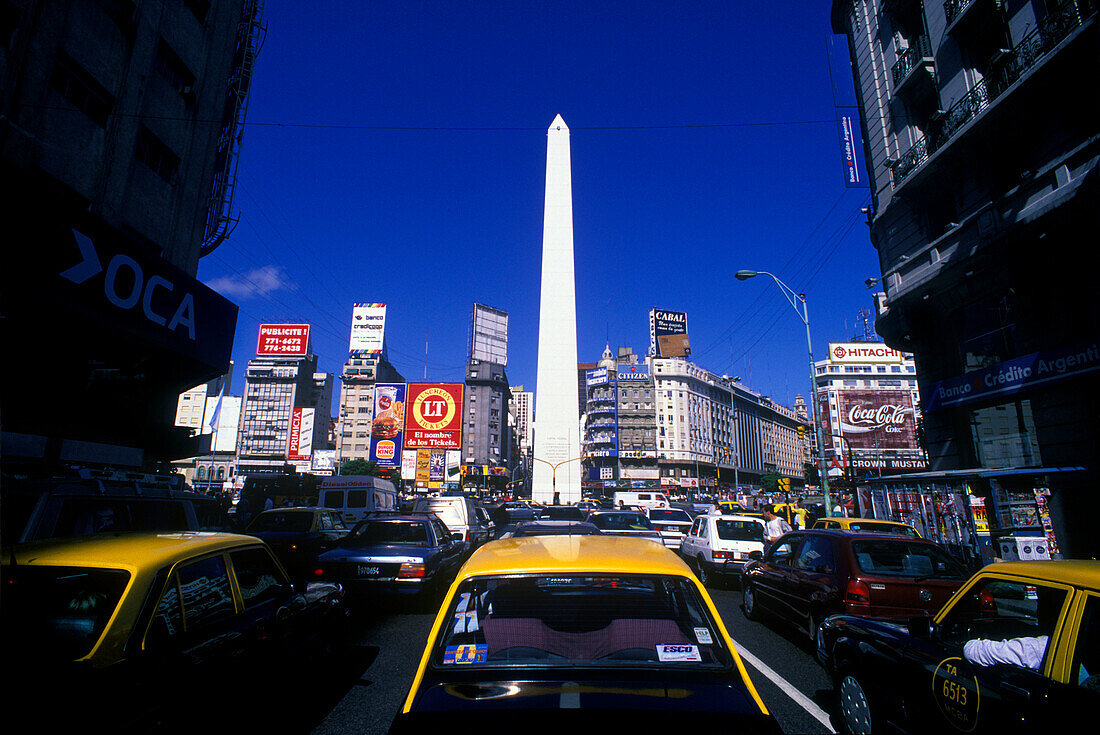 Street scene, taxis, obelisk, Plaza de republica, Buenos aires, Argentina.