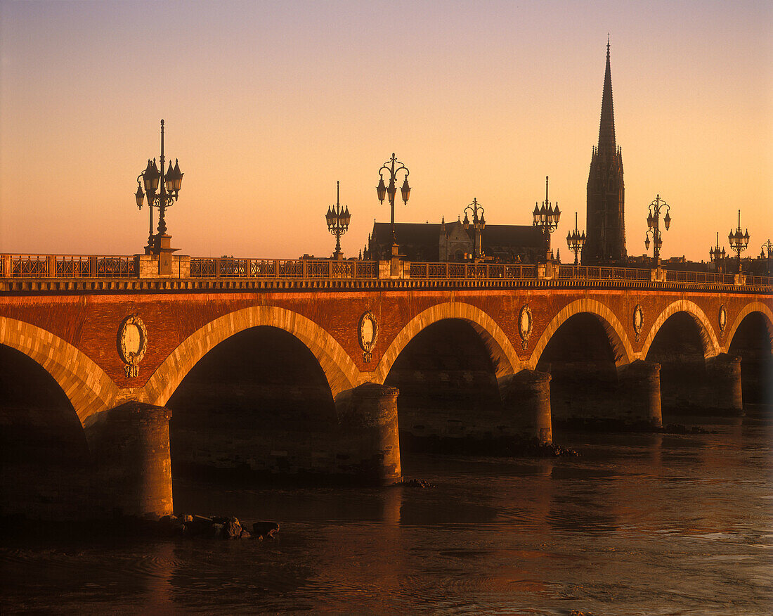 Pont de pierre bridge & tour saint michel, River garonne, Bordeaux, France.