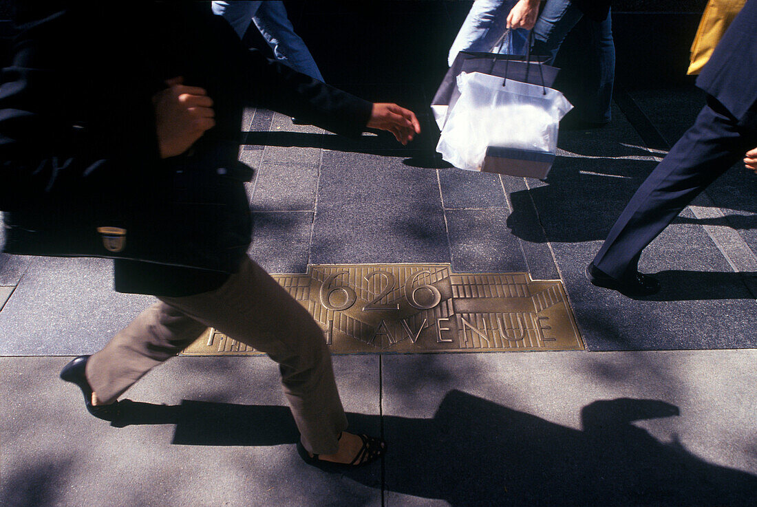 Shoppers walking, Fifth Avenue, Manhattan, New York, USA