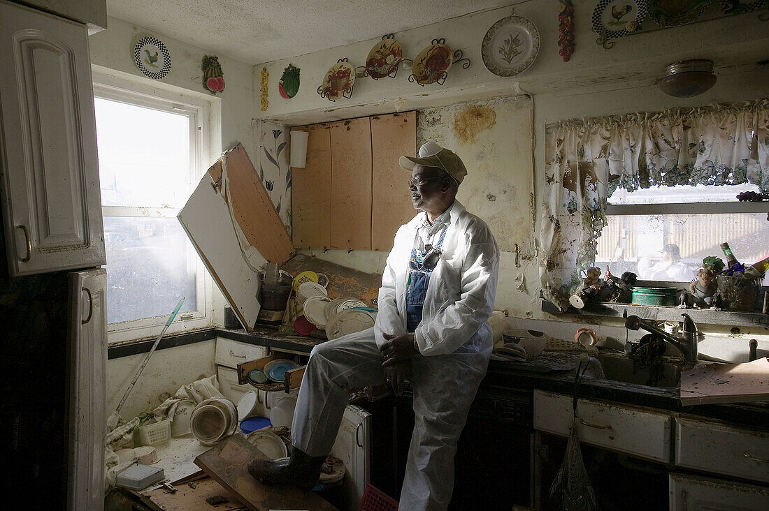 Mr Perry Chester at his home, Hurricane Katrina damage at New Orleans. USA.