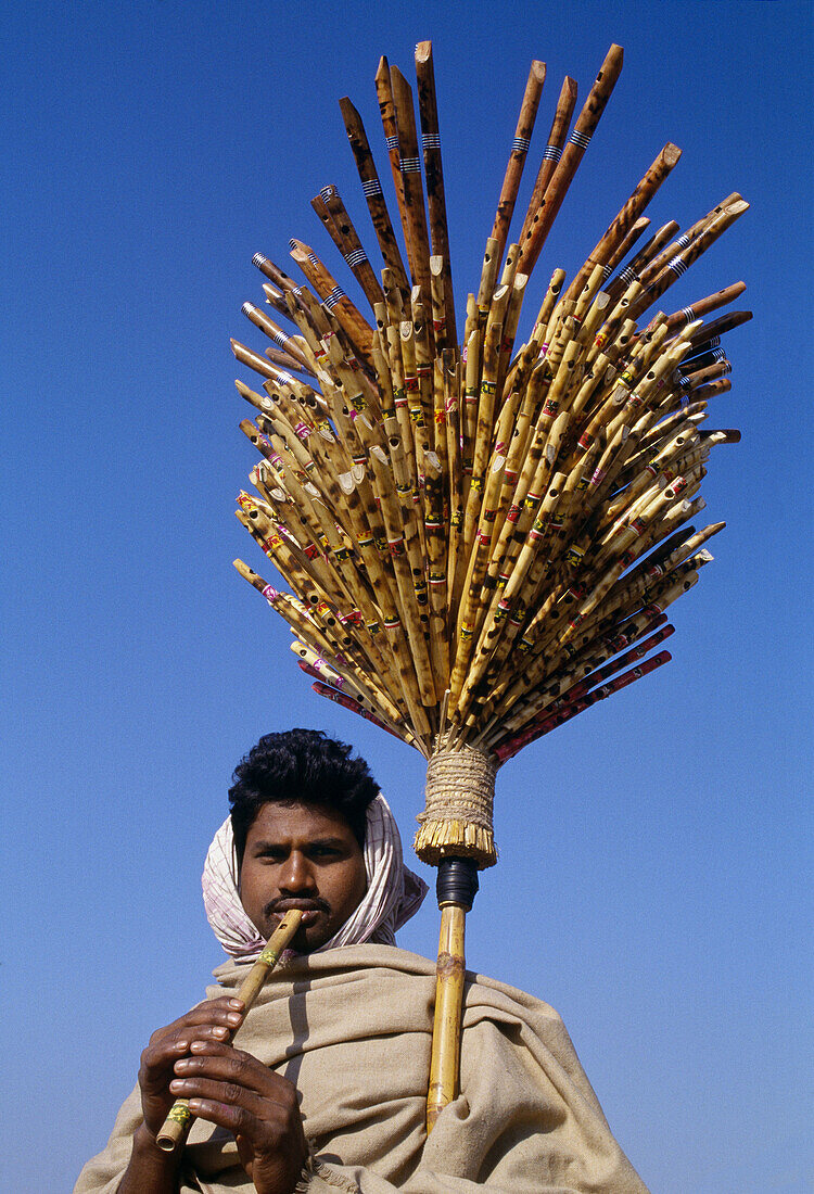 Flutes seller, Varanasi. Uttar Pradesh, India