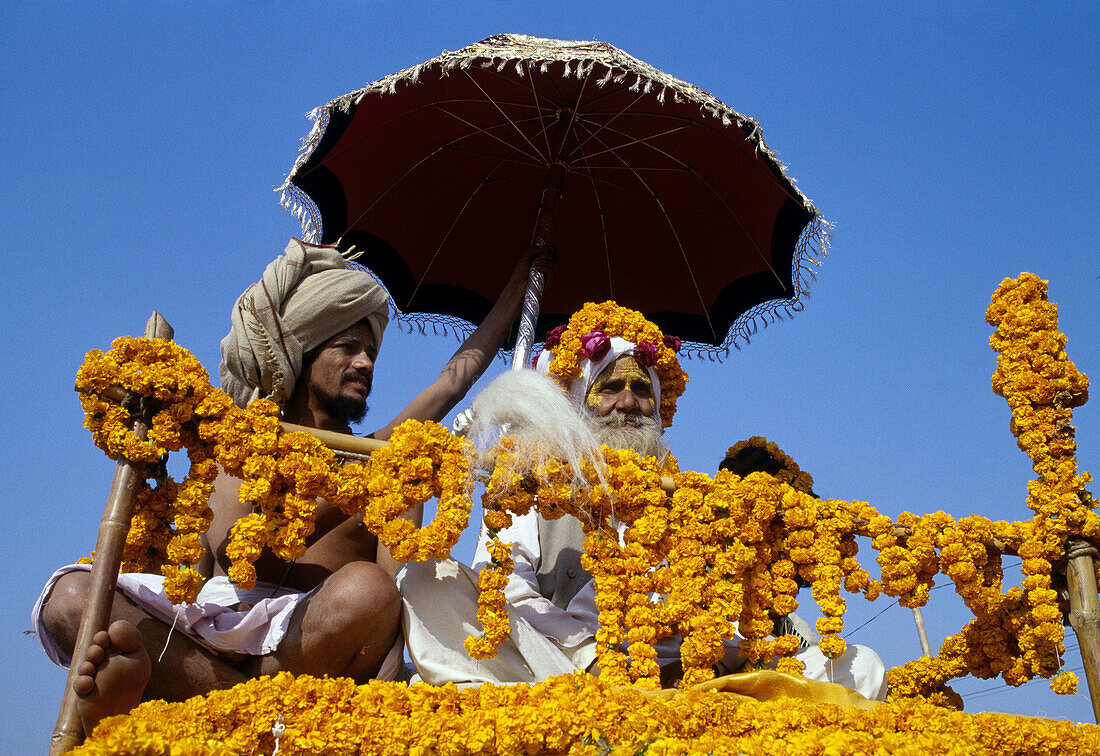 Procession of pilgrims going for a holy bath in Ganges River during Khumb Mela Festival (2001), Allahabad. Uttar Pradesh, India