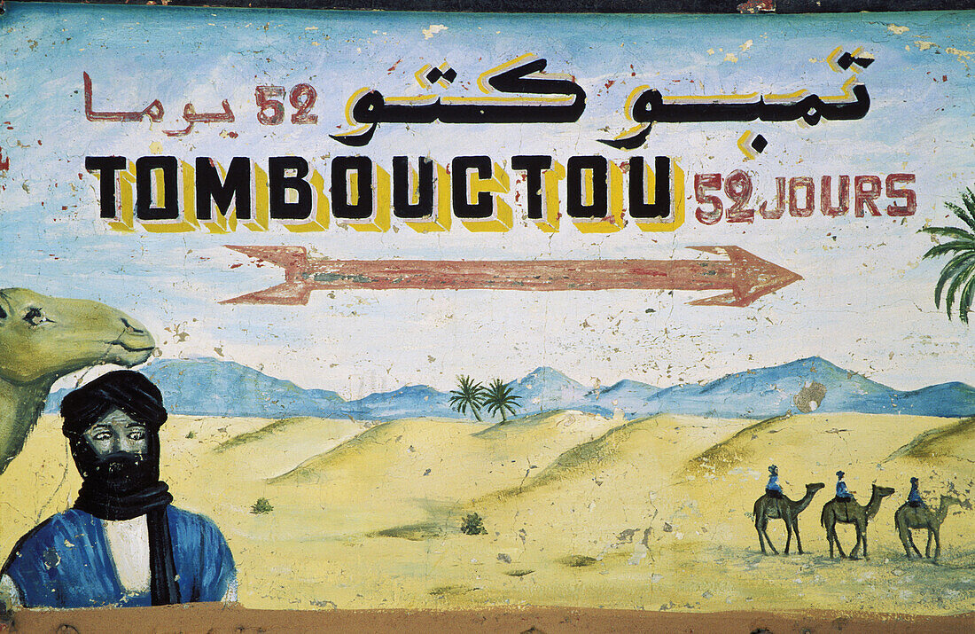 Famous roadsign in Zagora 52 days (by camel) to Tombouctou . Drâa valley, southern Morocco.