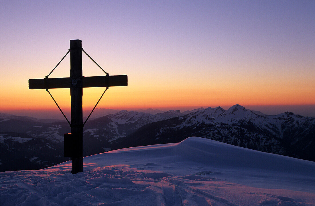 cross on summit of Weitschartenkopf with view to Chiemgau range, Berchtesgaden range, Upper Bavaria,Bavaria, Germany