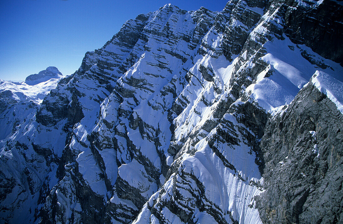 deeply snow-covered east face of Watzmann seen from Drittes Watzmannkind, Berchtesgaden range, Upper Bavaria, Bavaria, Germany