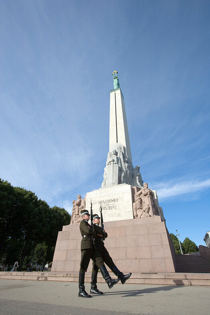 Two guards, soldiers, in front of the Freedom monument, Riga, Latvia