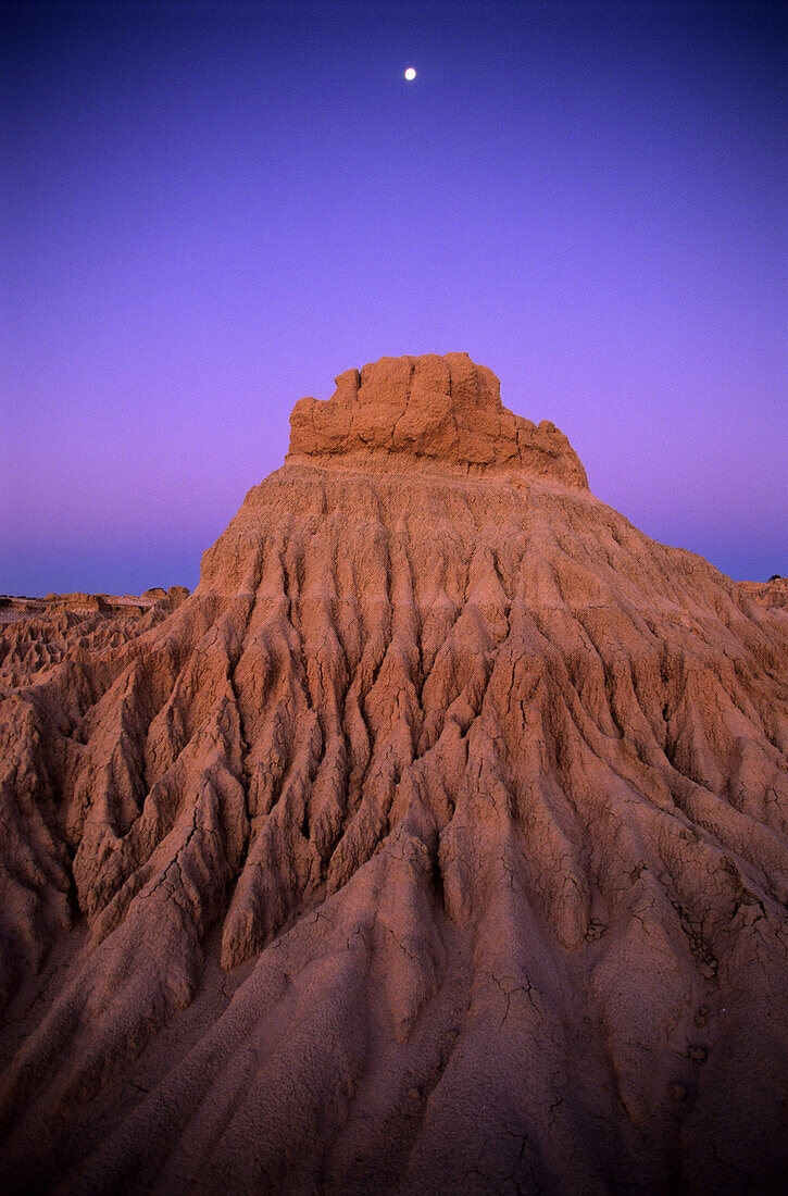 the eroded remnants of the Wall of China, an ancient sand dune in the evening light, Mungo National Park, New South Wales, Australia