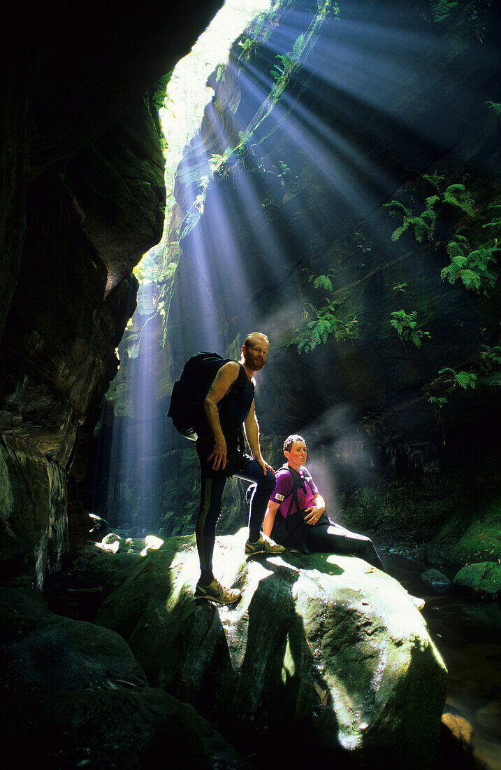 Two people canyoning in Rocky Creek Canyon, Blue Mountains National Park, New South Wales, Australia