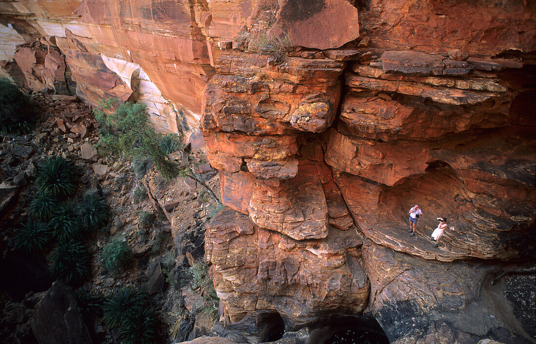 Two tourists at Kings Canyon in Watarrka National Park, Central Australia, Northern Territory, Australia