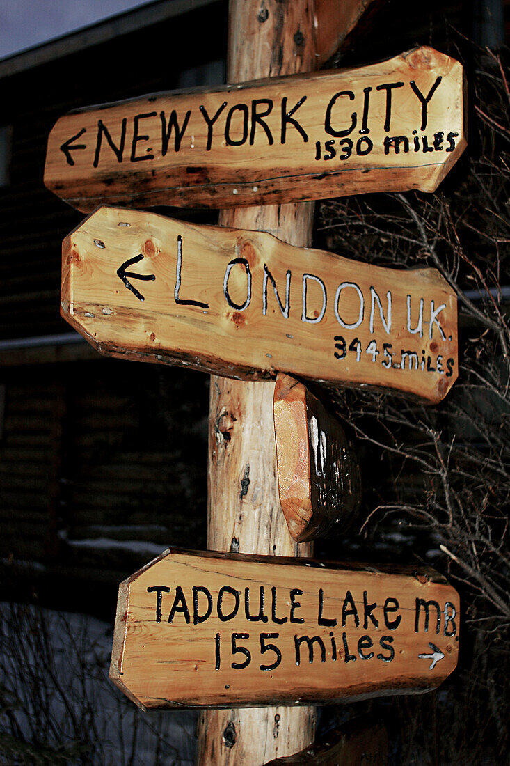 Sign post at the Lazy Bear Lodge in Churchill, Manitoba, Canada.
