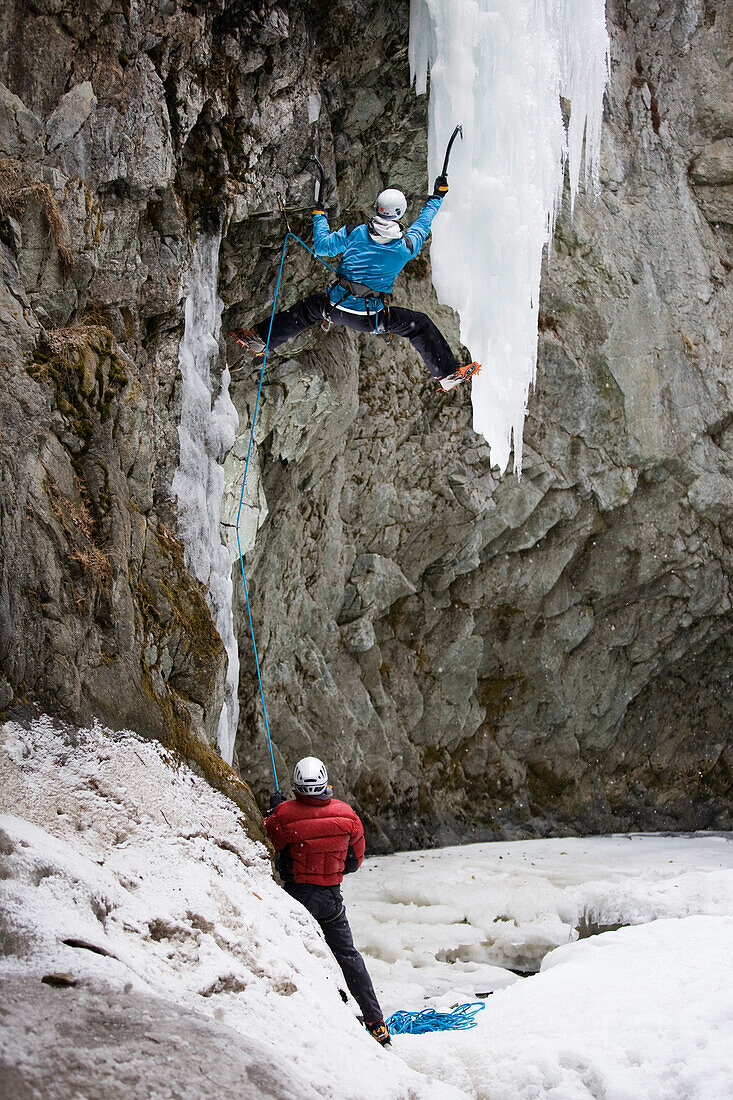 Two persons ice climbing in a gorge, Pontresina, Upper Engadin, Grisons, Switzerland