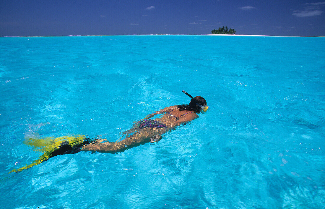 A woman snorkeling near tiny Prison Island, Australian