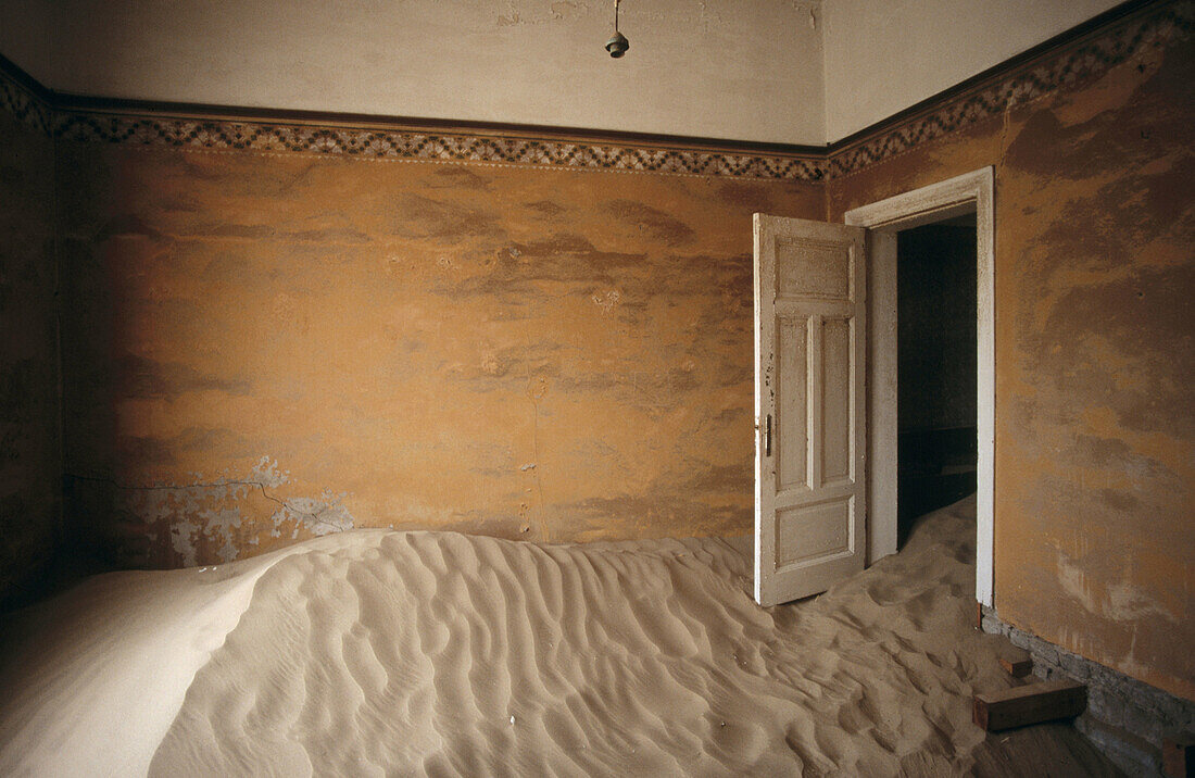 Abandoned village and dunes. Kolmanskop. Namib desert. Namibia