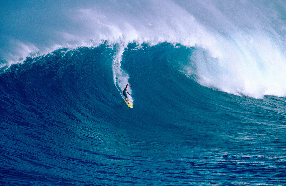 Surfing Jaws , a 30 wave on the north shore of Maui, Hawaii