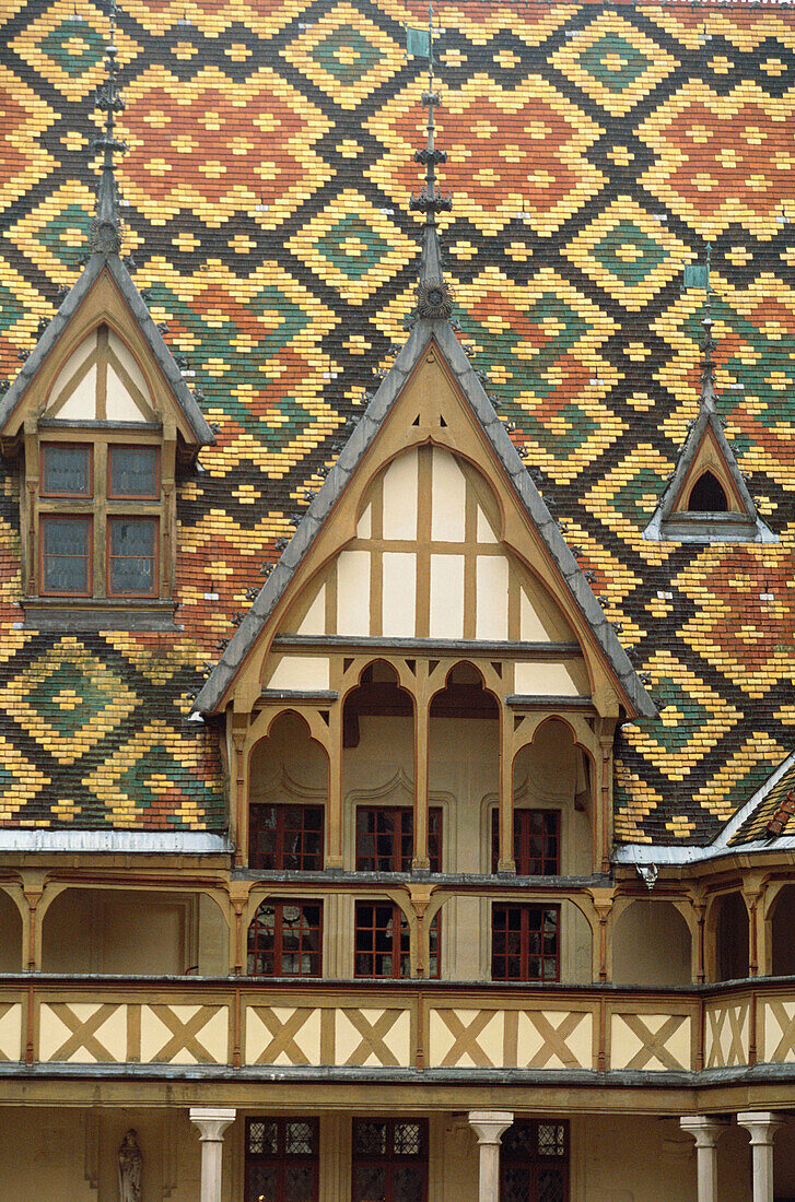 Ceramic tiled roof of Hotel Dieu (1443). Beaune. Burgundy. France